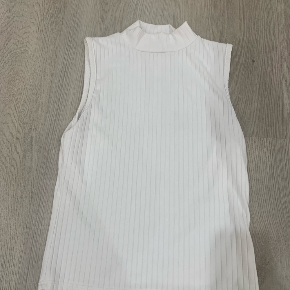 Olivia Rae sleeveless turtleneck